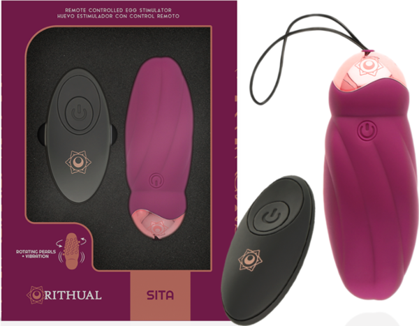 Œuf vibrant Rithual Sita à rotation posé à côté de sa télécommande