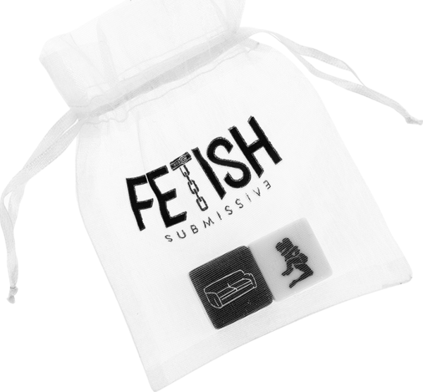 Dés sexuels Fetish Submissive, un blanc et un noir, à côté de leur pochette en satin